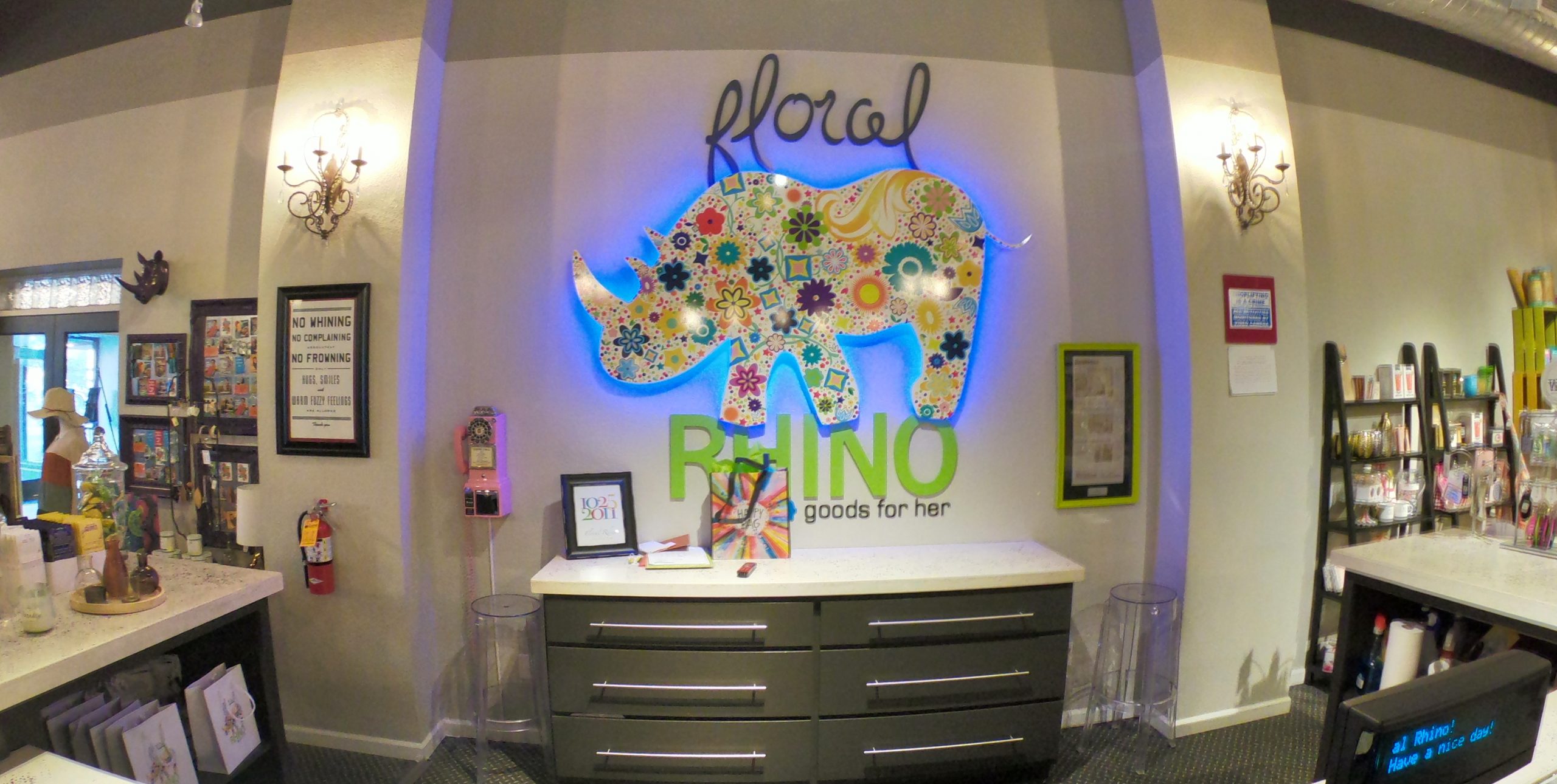 Floral Rhino logo at checkout counter - Casper WY